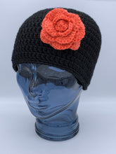 Load image into Gallery viewer, Crochet black beanie hat with orange flower- Size medium adult
